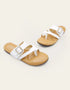 White Stravia criss-cross flats with jeweled buckle